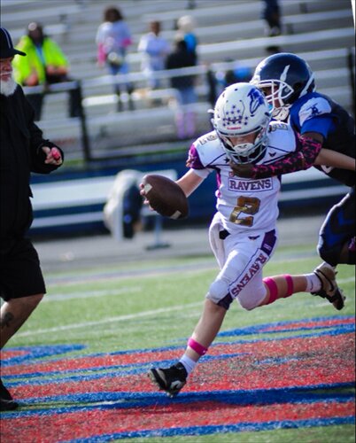 Luke running through a tackle!